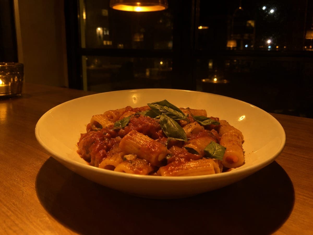 Poor example: the same pasta by a window at midday and under a pendant light at night